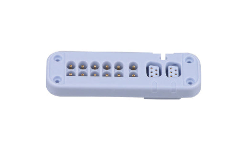 White electronic module with connectors on a white background
