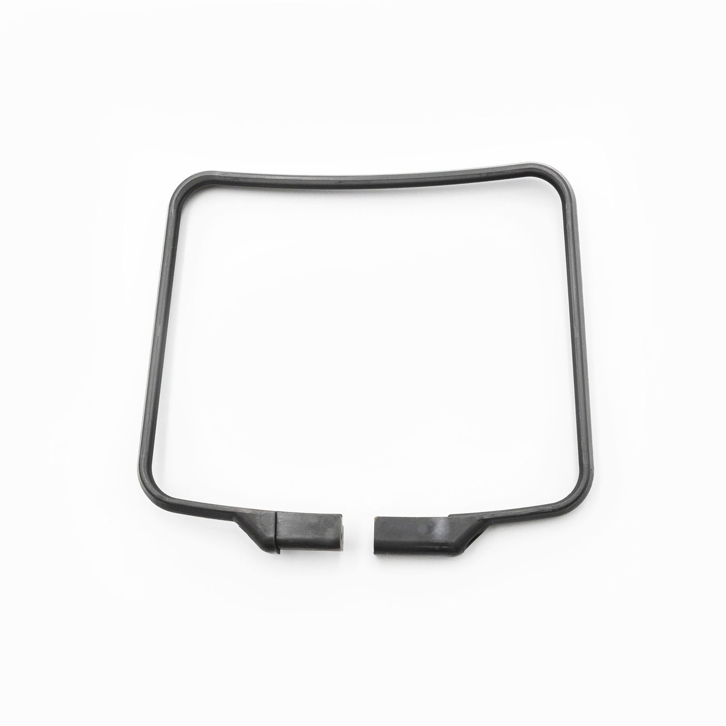 A black clamp, bellows, foot support for medical equipment, with a rectangular shape and a notch on one side.