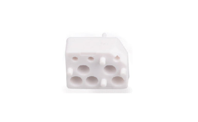 White ceramic product with holes on a white background