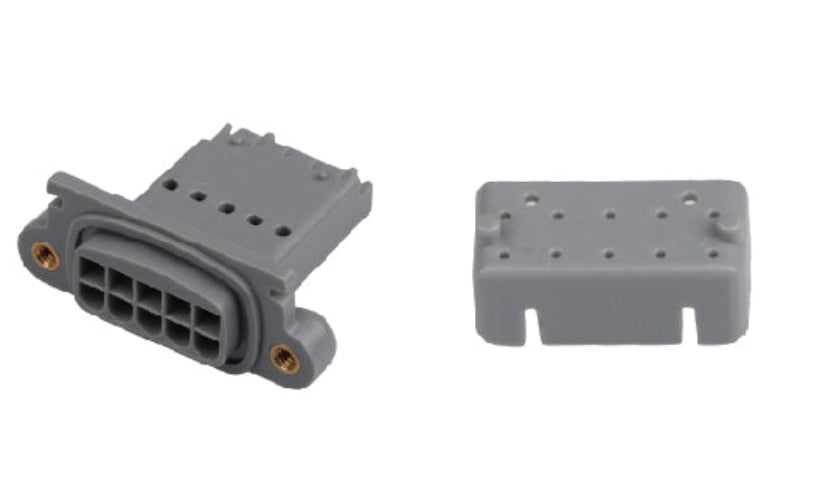 Two gray plastic connectors on a white background