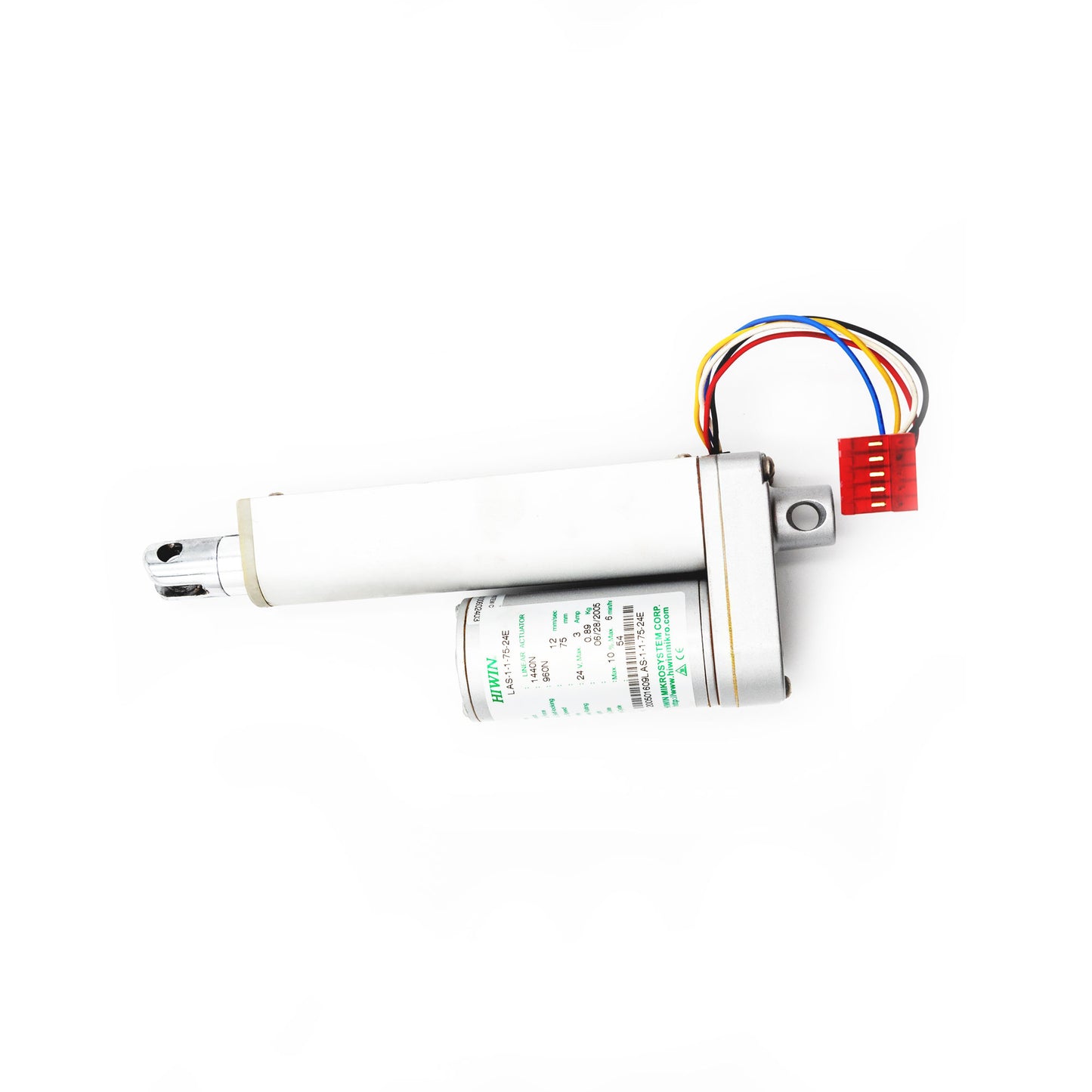 A white linear actuator with a label and multicolored wires attached to it.