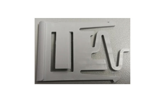 Metallic emblem with a design on a white background