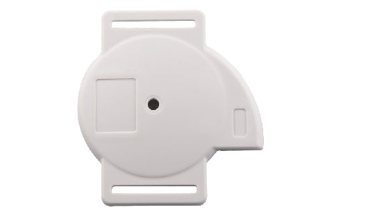 White plastic component with a central hole on a white background