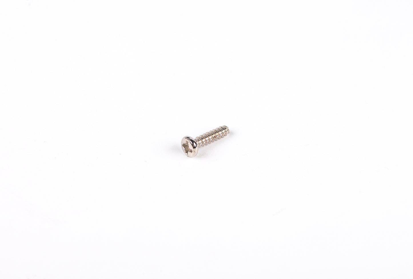 Metal screw on a white background