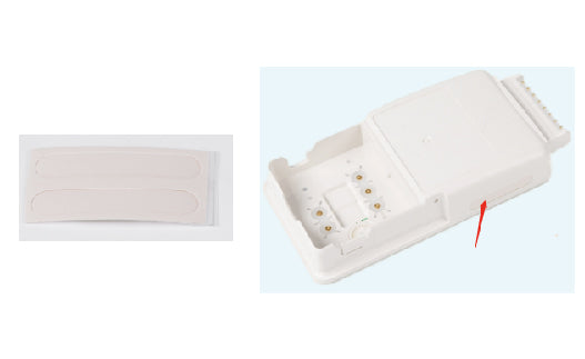 White plastic tray with small items on a light blue background