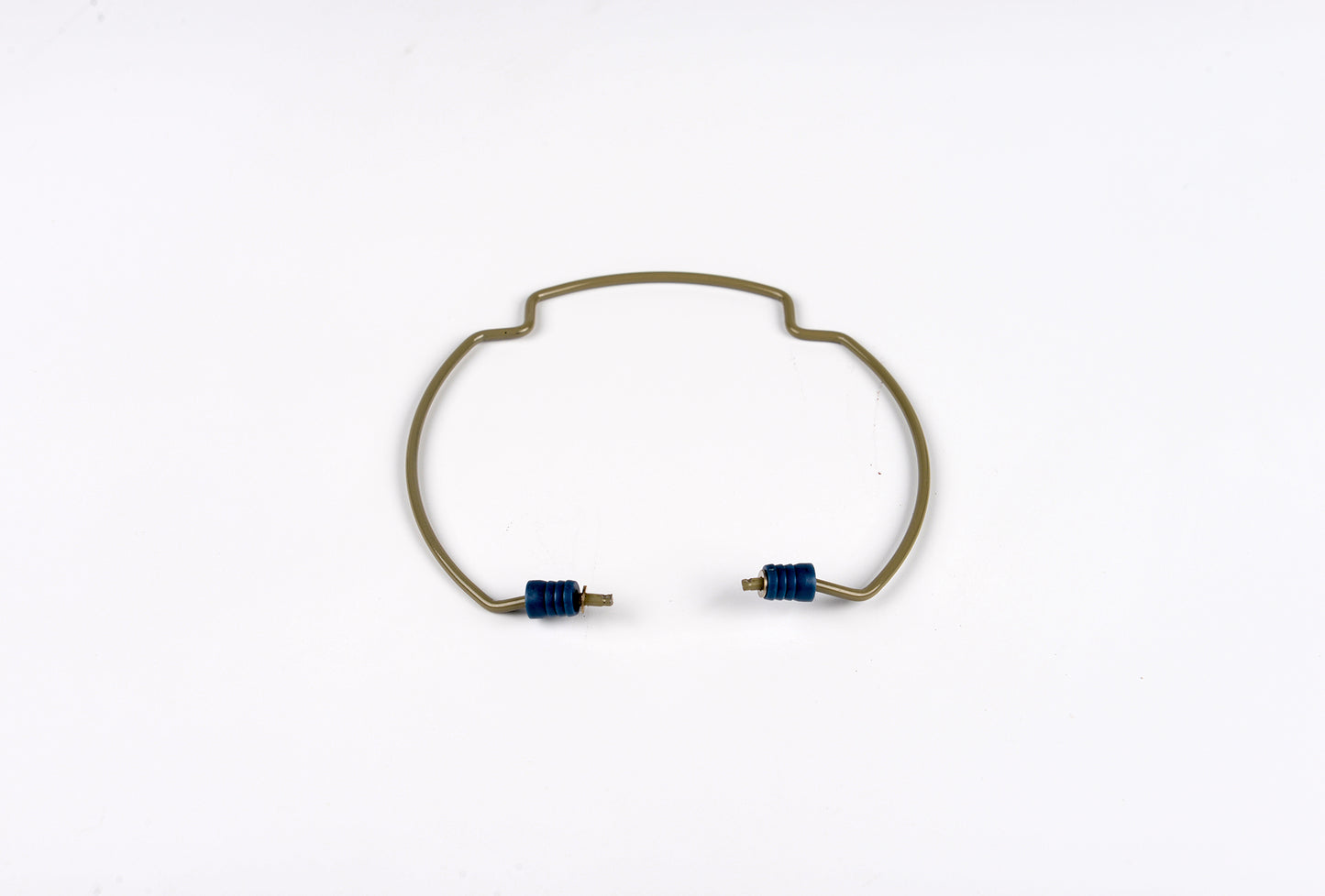 Gold bracelet with blue stones on a white background