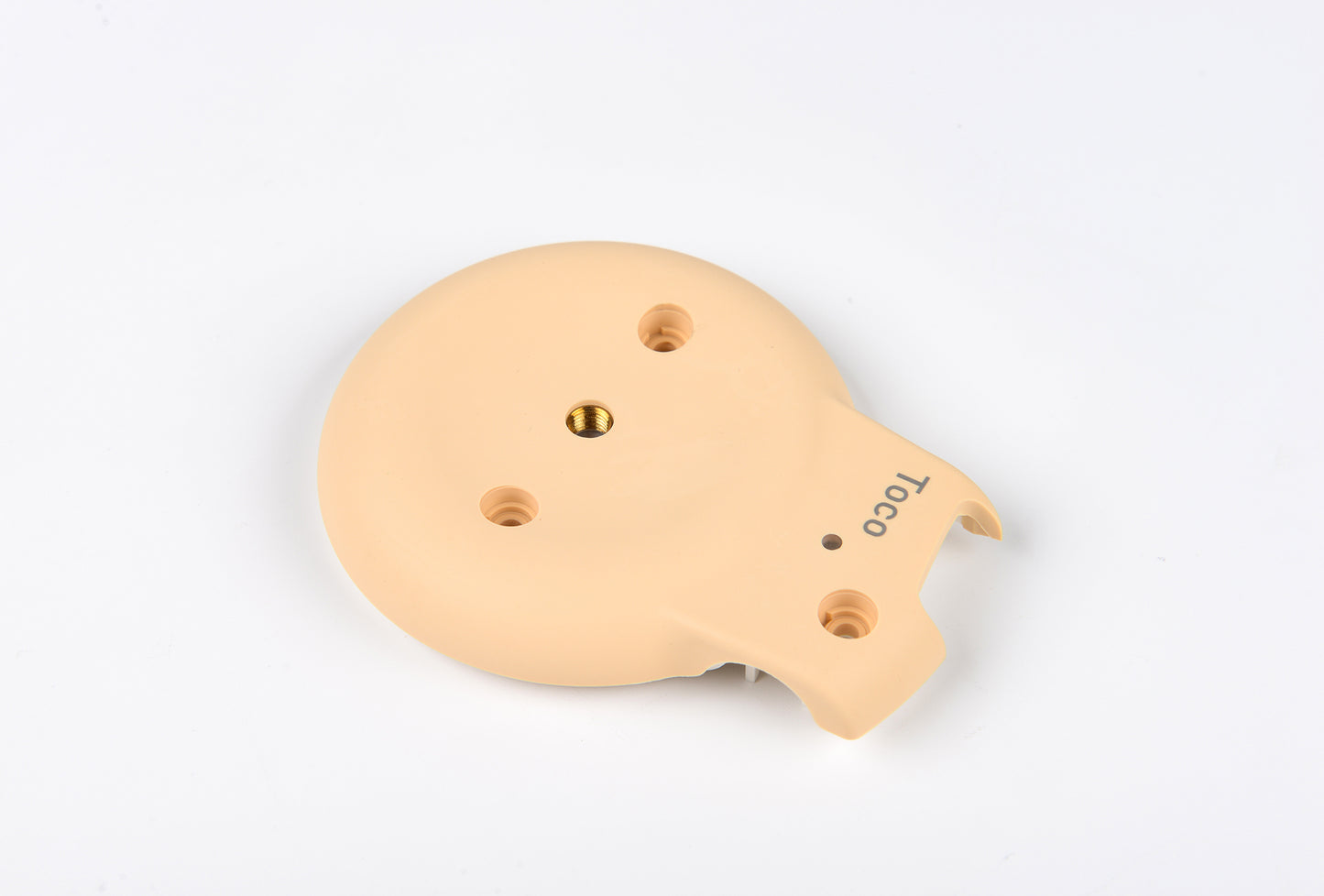 Beige plastic component with holes on a white background