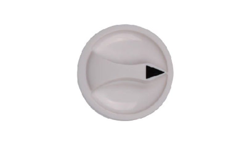 Round metallic knob with a black triangle on a white background