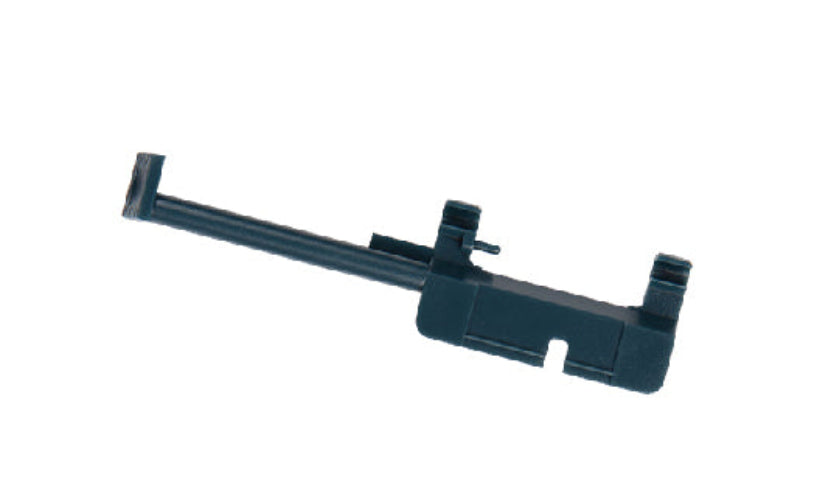 Black plastic component on a white background