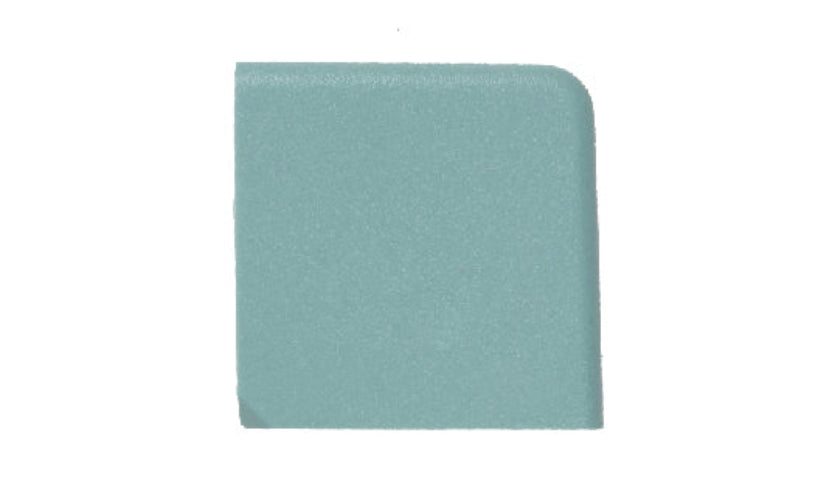 Teal plastic swatch on a white background