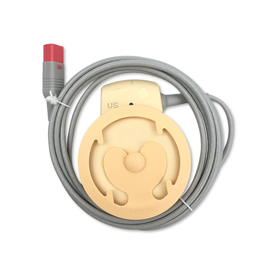 A medical device transducer cable with a grey body and a beige circular probe at one end.