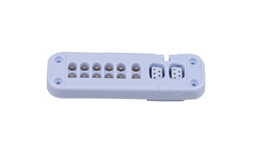 White electronic module with connectors on a white background