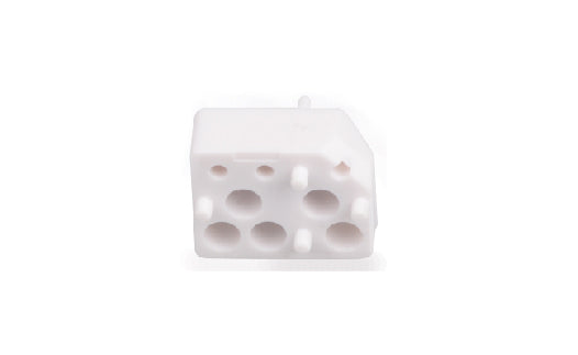 White ceramic product with holes on a white background