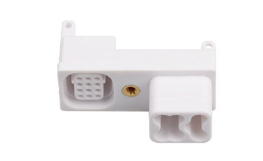 White electronic connector with multiple ports on a white background