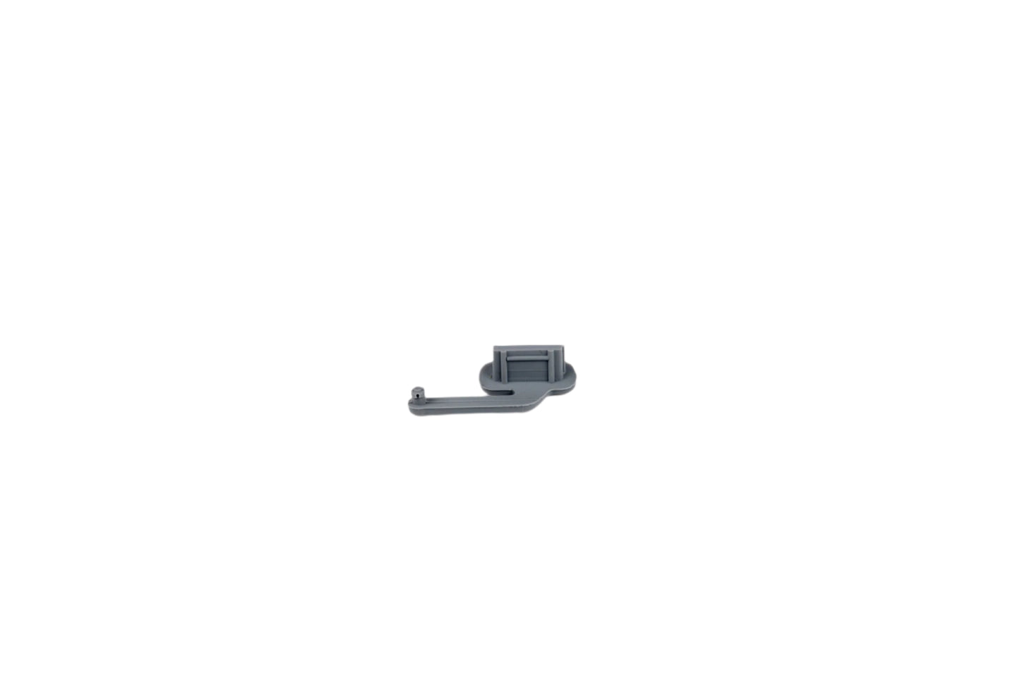 Small metallic object on a white background