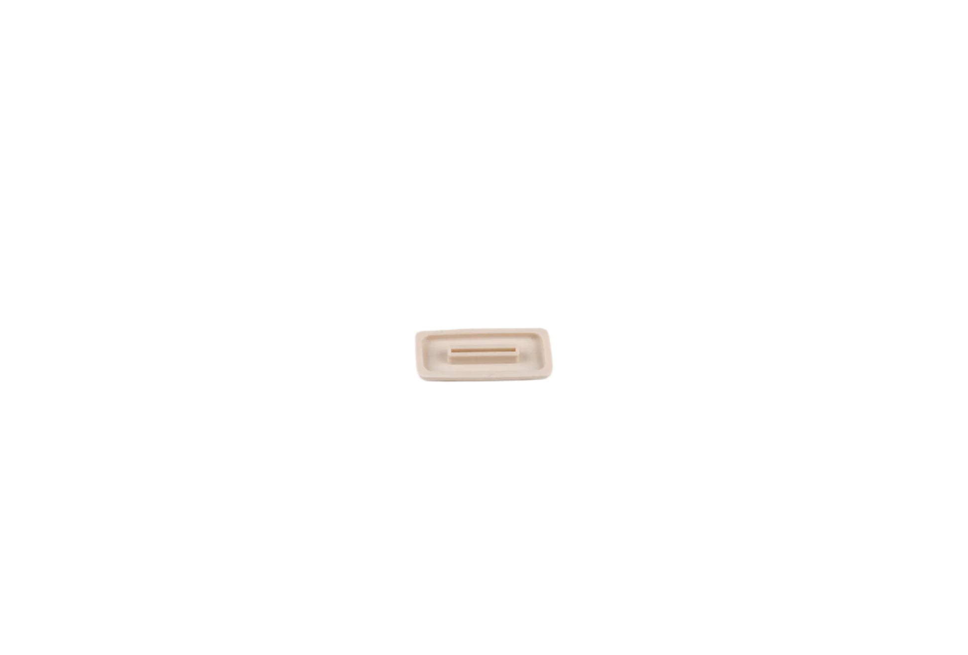 Rectangular beige object on a white background