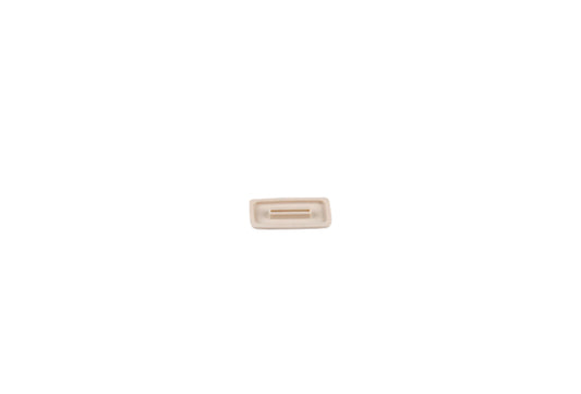 Rectangular beige object on a white background