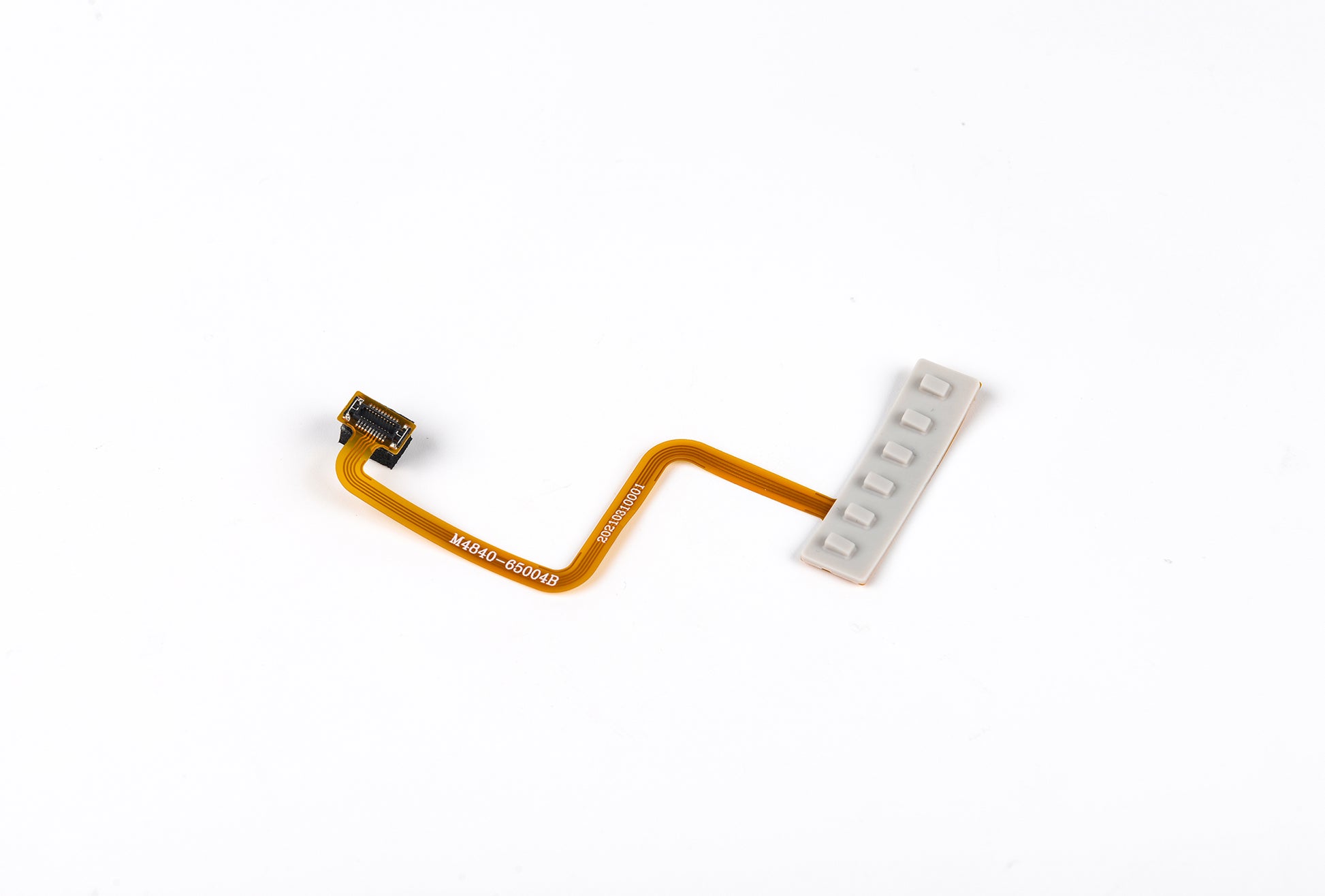 Flexible circuit board with connectors on a white background