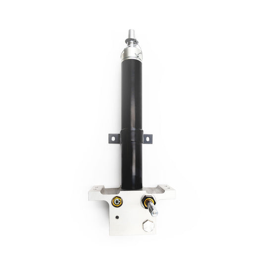 This is an image of a Hillrom compatible foot hydraulic cylinder, predominantly black in color, with a white base featuring mounting brackets and control valves.