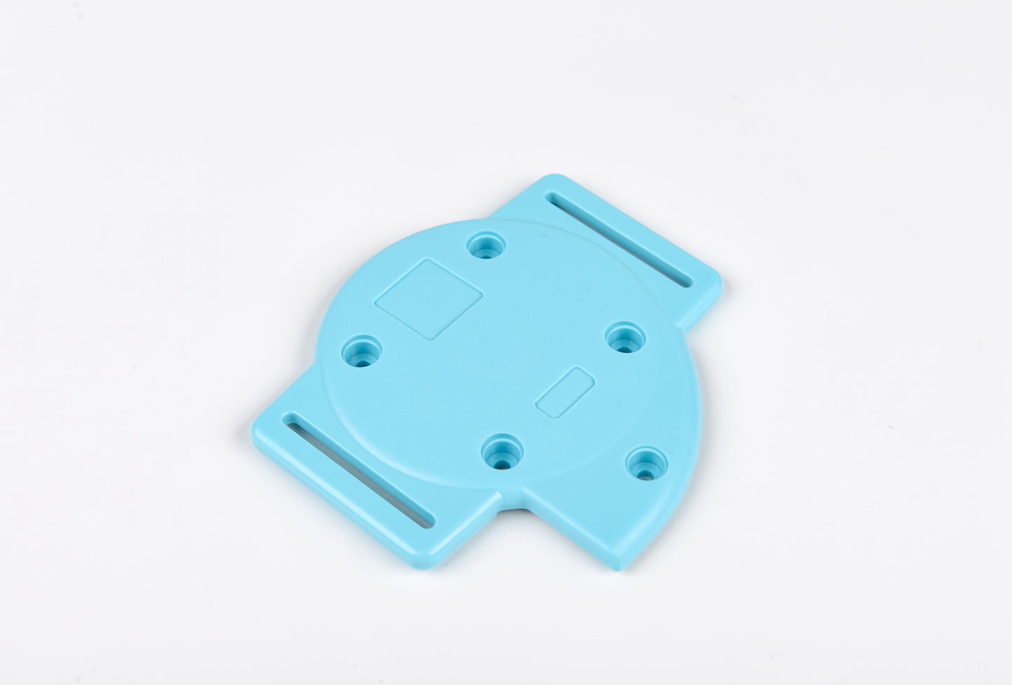 Blue plastic component on a white background