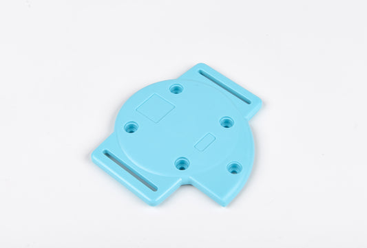 Blue plastic component on a white background