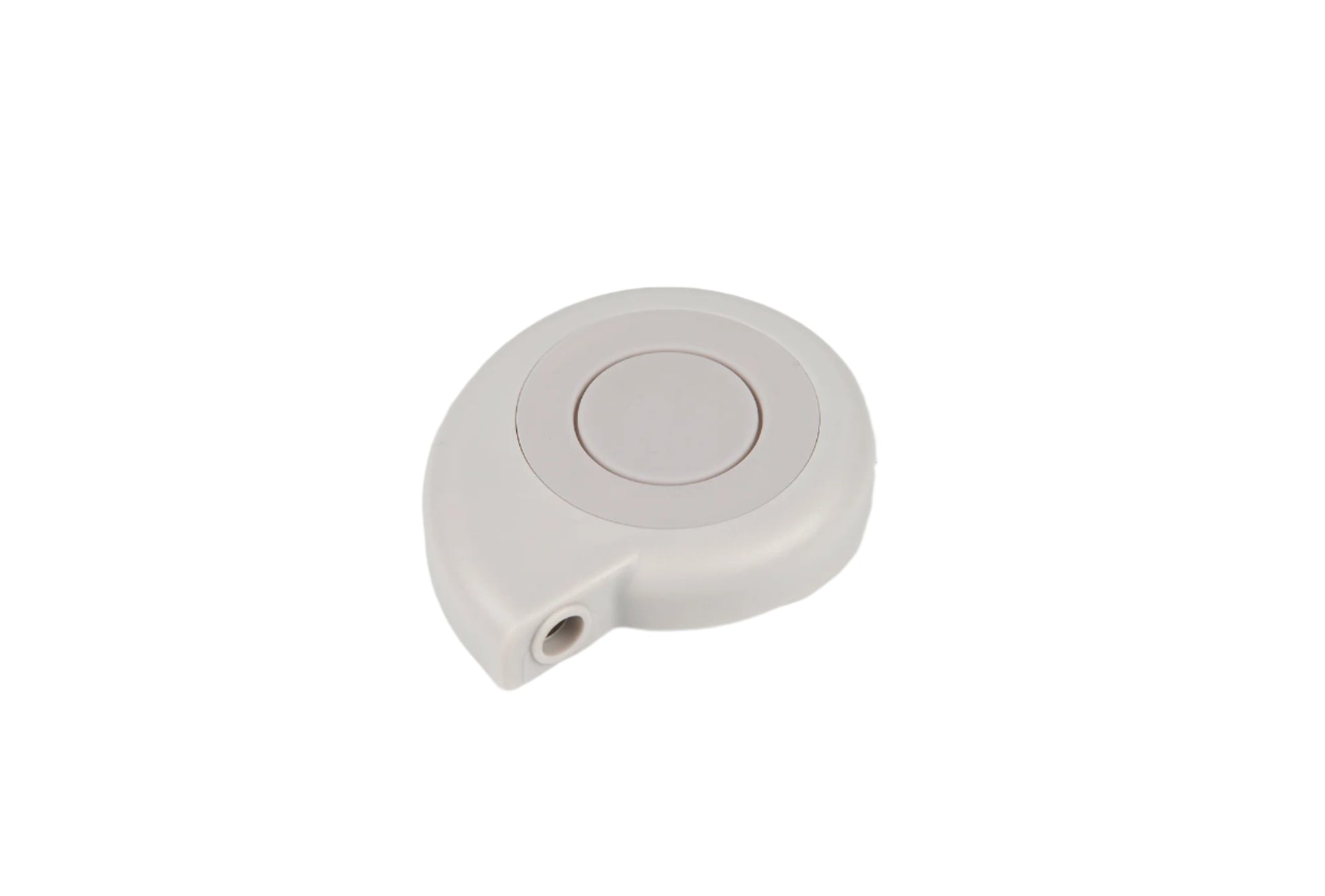 Round white object with a central circular component on a light gray background