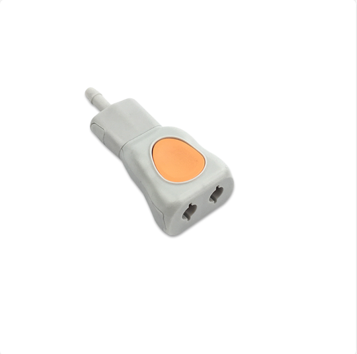White electronic device with a orange button on a white background