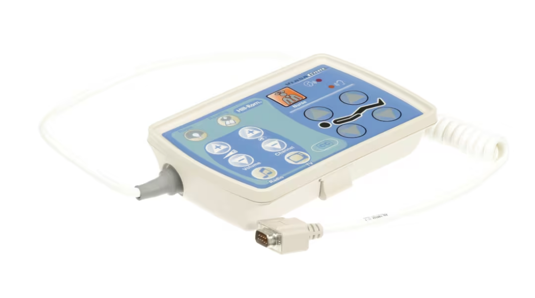 A medical alert pendant with a blue and white display screen, buttons, and a attached medical information card.