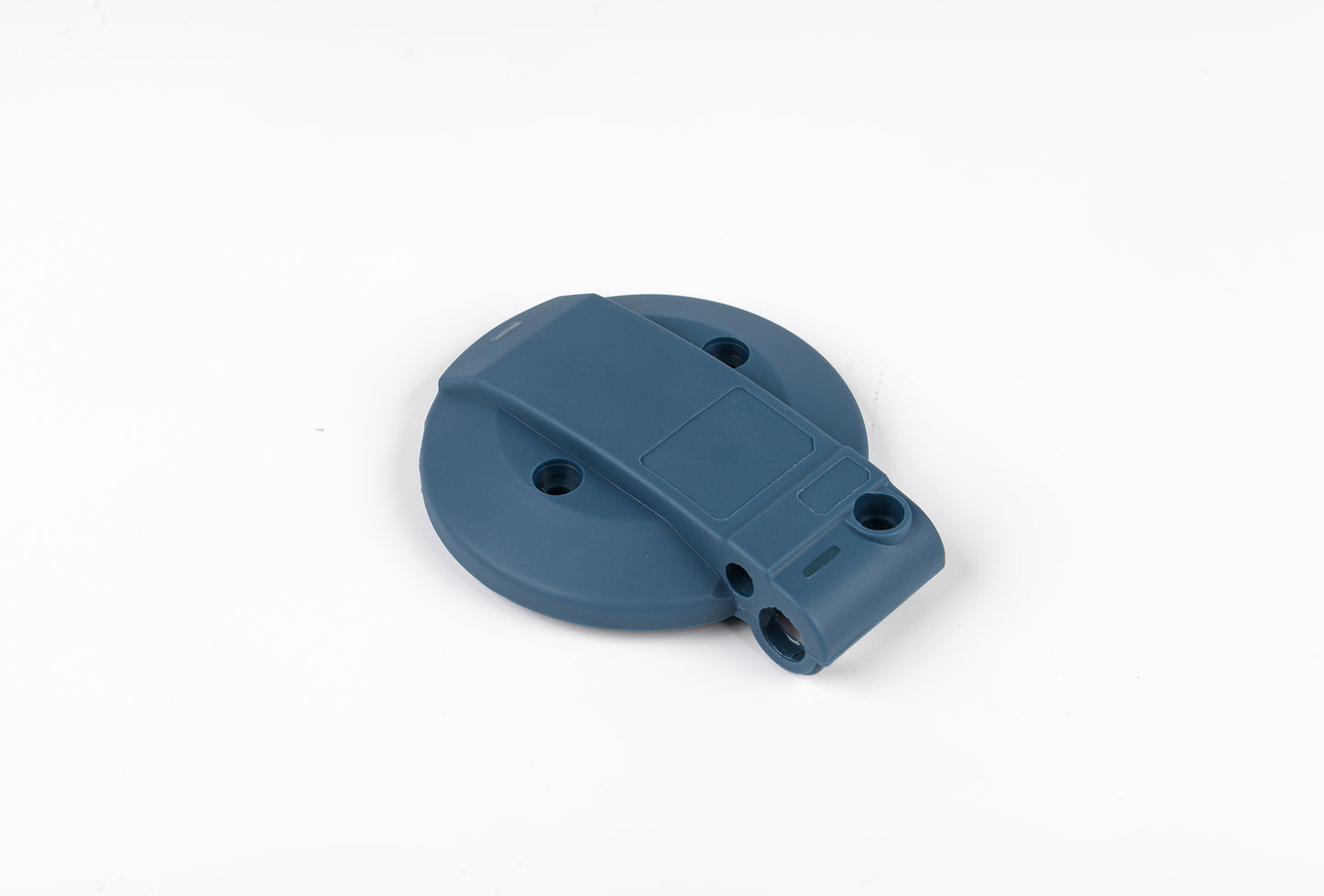 Blue plastic component on a white background