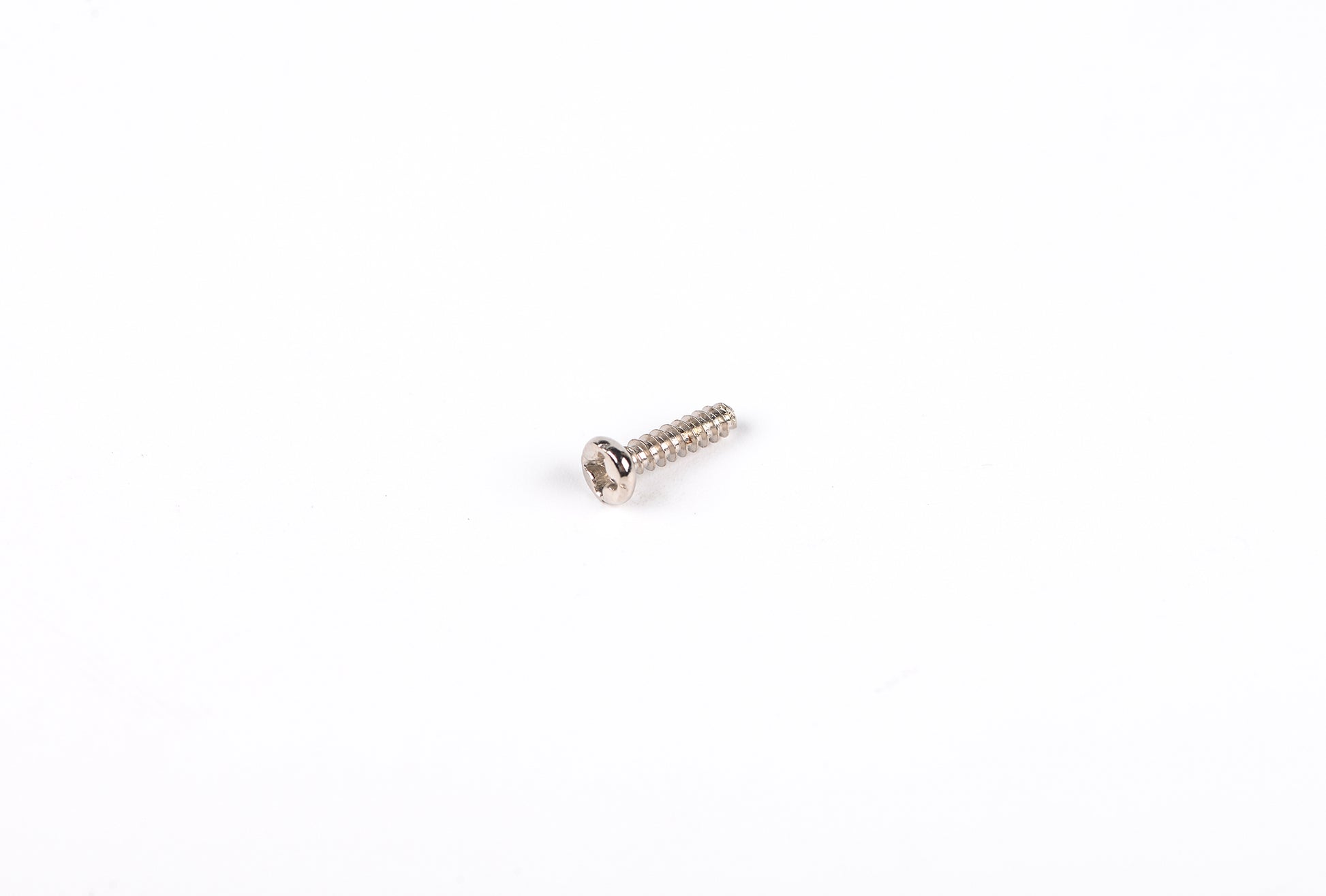 Metal screw on a white background