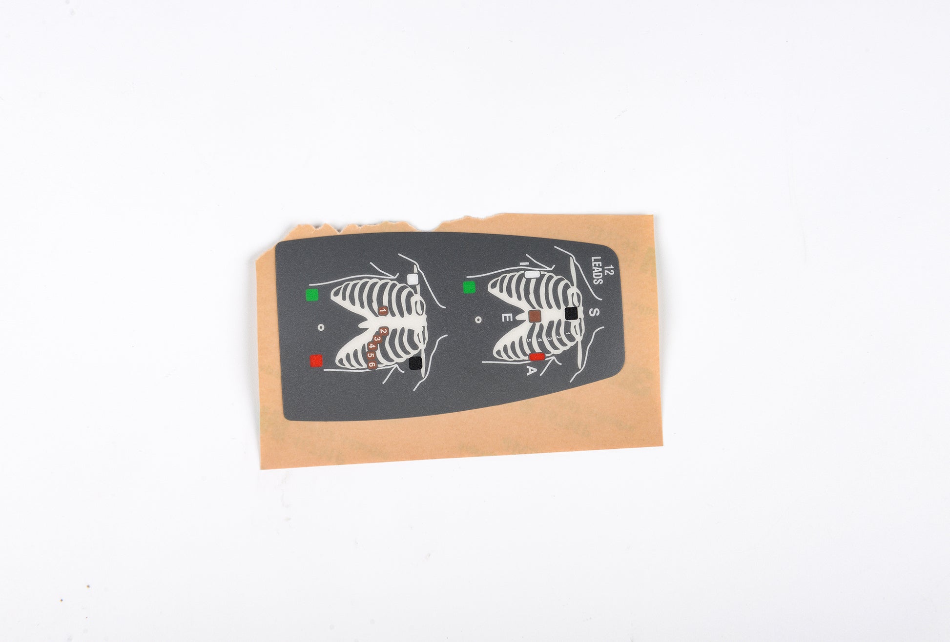 Cardboard packaging with a gray electronic device on a white background