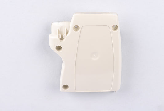 White plastic component with screws on a light gray background