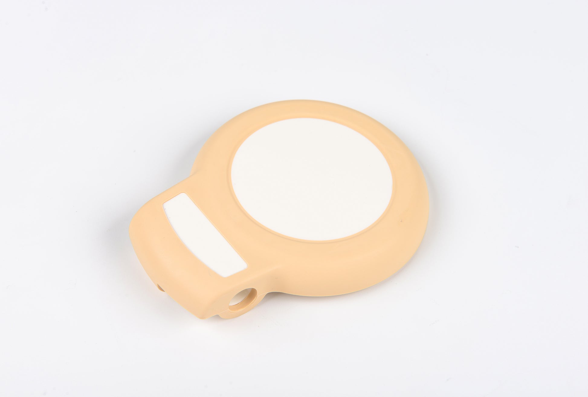 Beige light bulb-shaped object on a white background