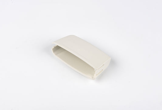 Beige rectangular object on a white background