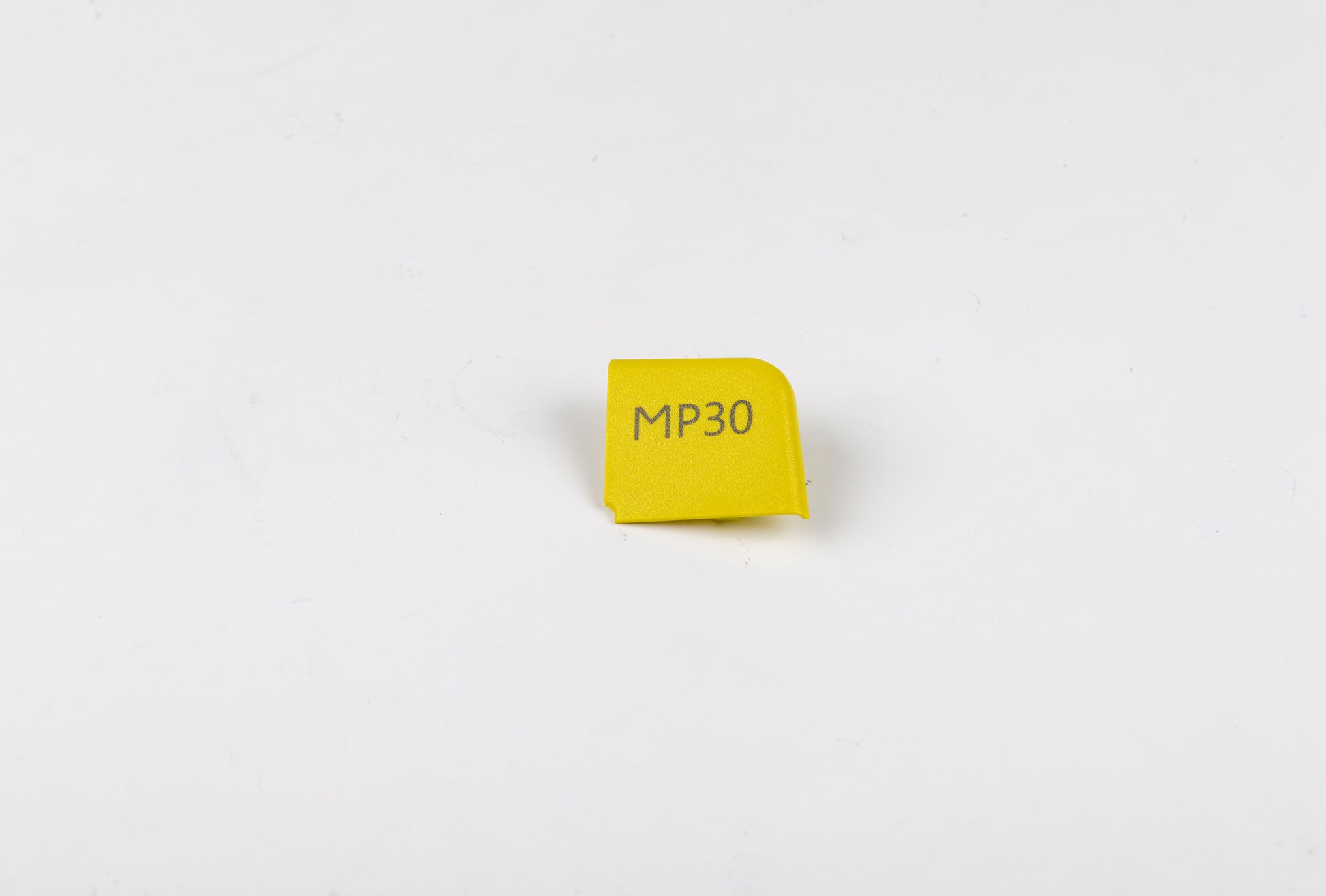 Yellow MP30 label on a white background