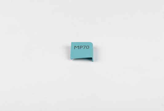 Small blue rectangular object with 'MP70' text on a light gray background