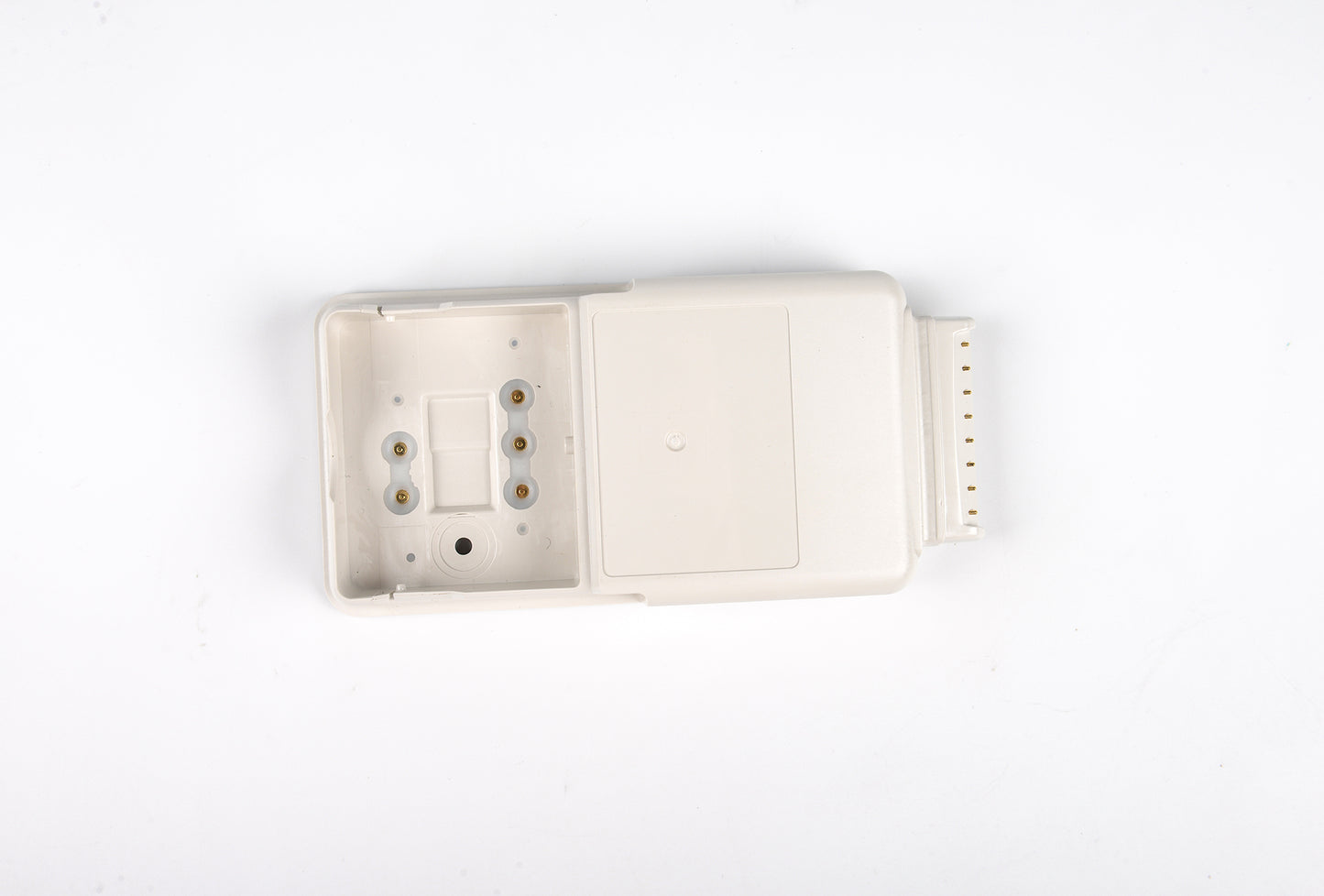 White plastic component on a white background