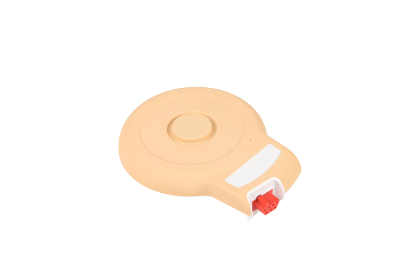 Beige plastic tool with a red component on a white background