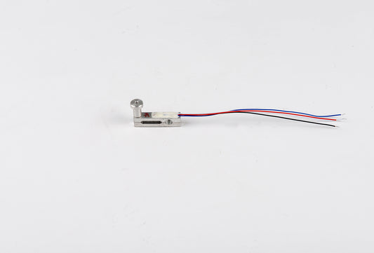 Small electronic component with wires on a white background