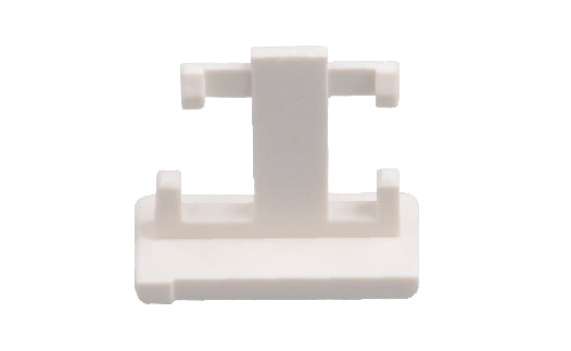 White plastic bracket on a white background