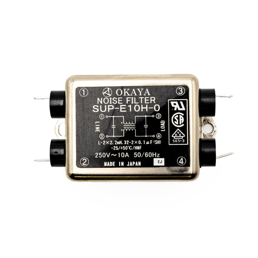 A photo of a noise filter with the brand name OKAYA and model number SUP-E10H-0. It has a label indicating it's a medical device compatible with Hillrom, and it's made in Japan.