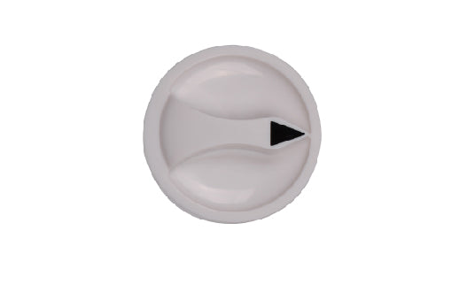 Round metallic knob with a black triangle on a white background